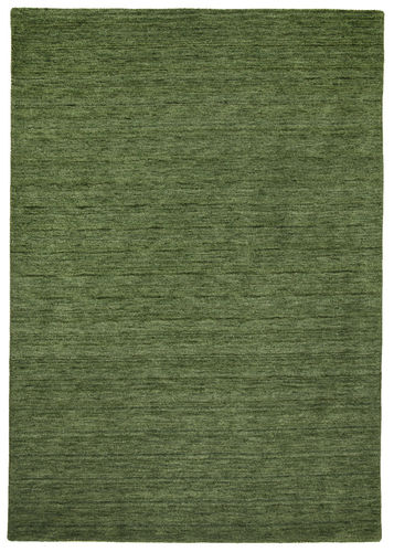 Modern designer carpet, hand-knotted plain green
